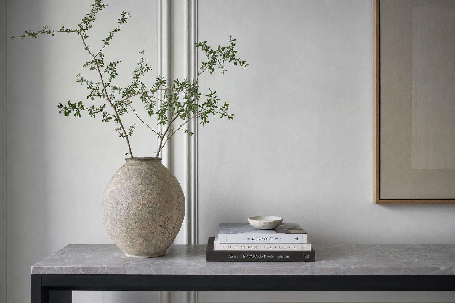 Kettlebell and yoga mat near a window, clean editorial still life
